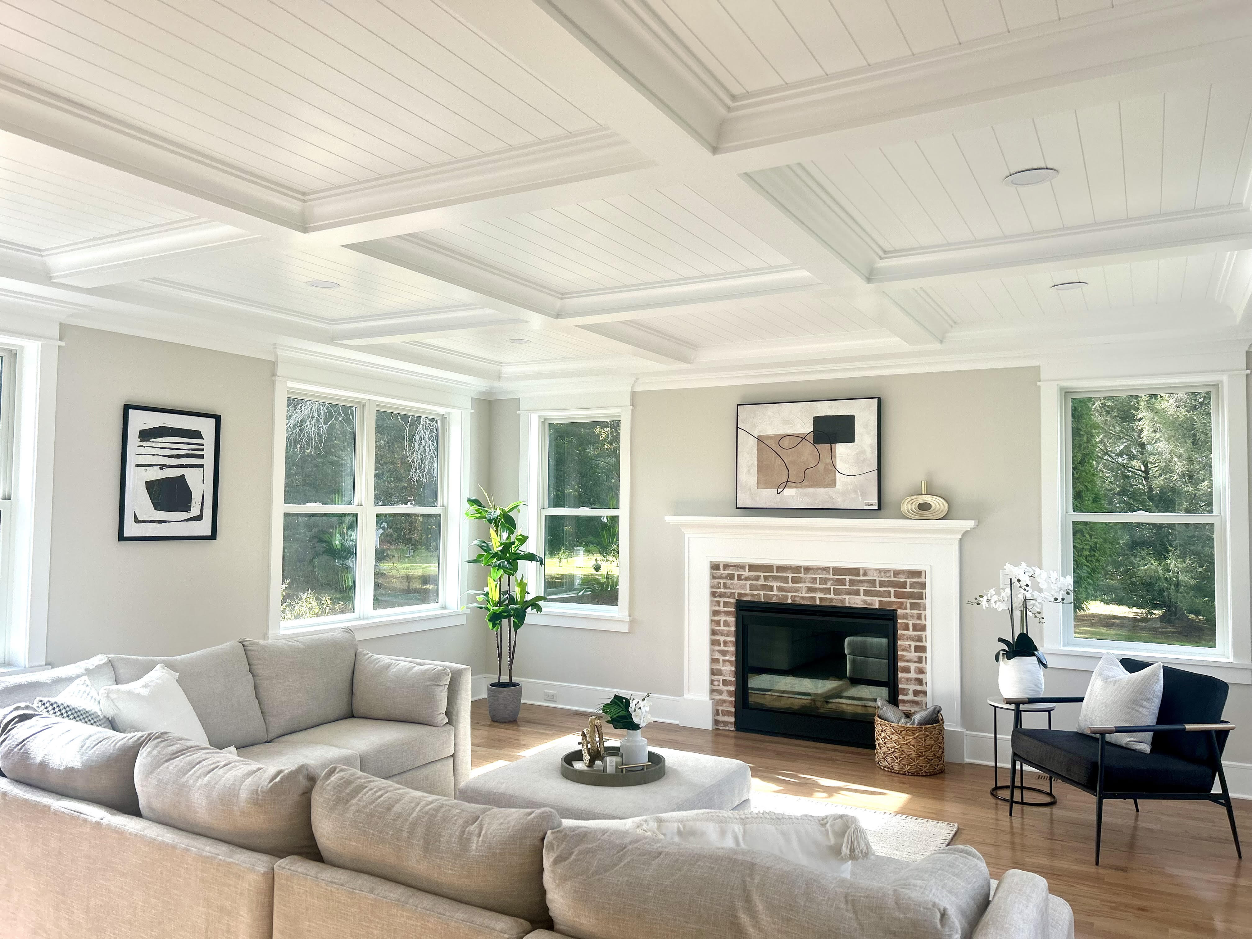 A modern living room with sleek furniture and contemporary decor.