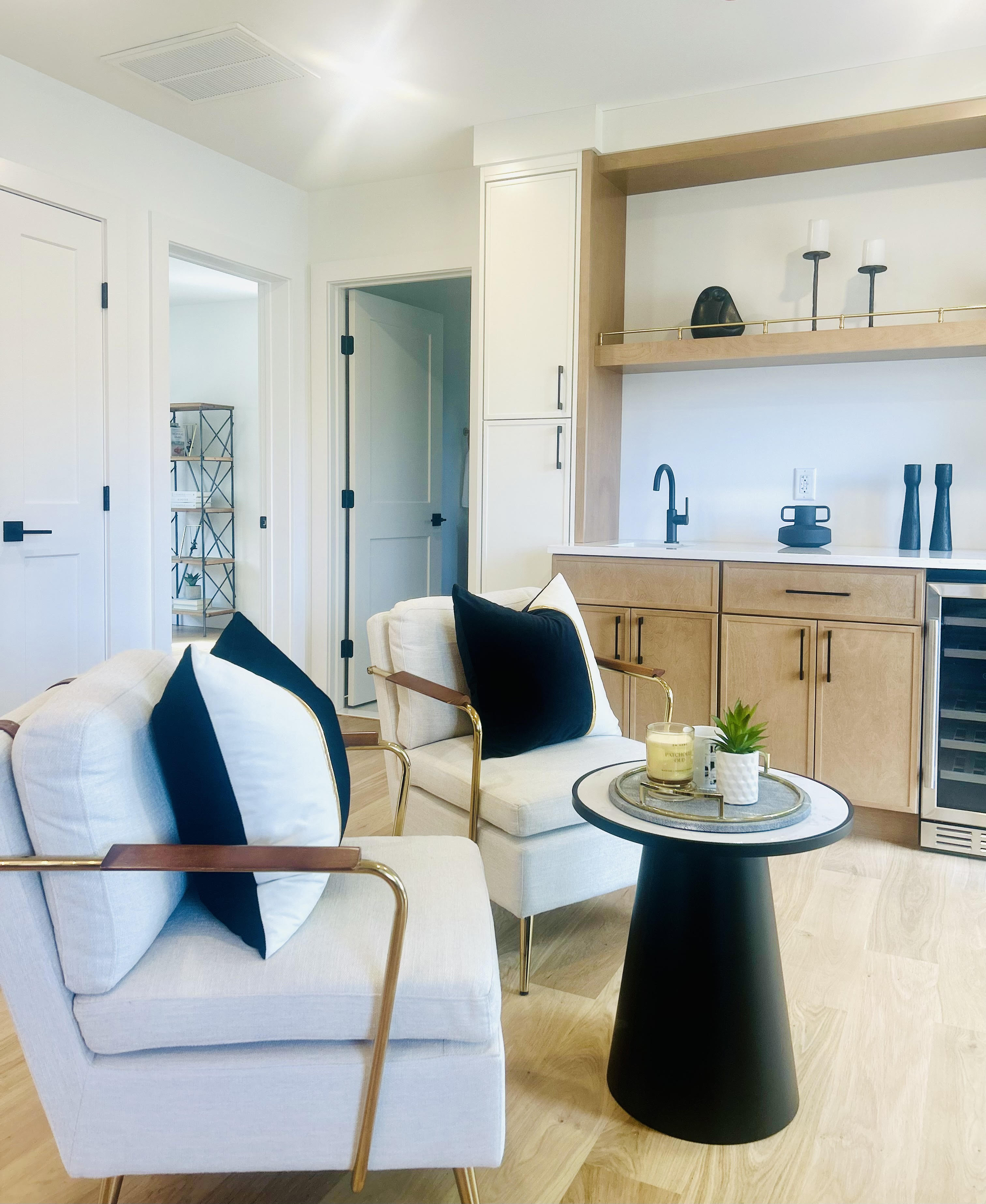 A chic seating area with modern furniture and elegant decor.